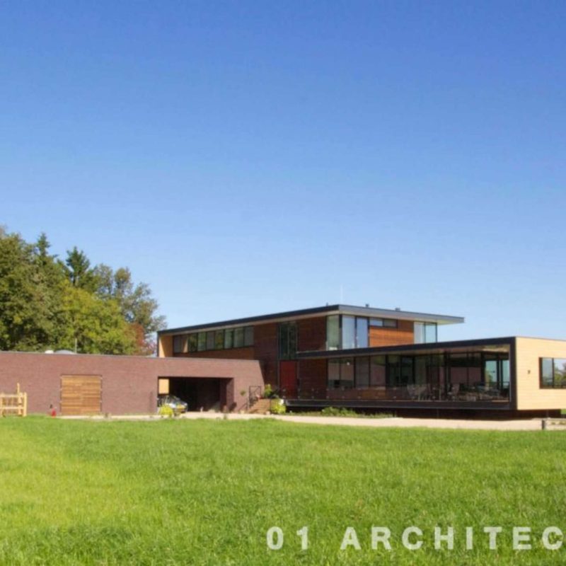 01 Architecten - Ruime villa met plat dak en bijgebouwen