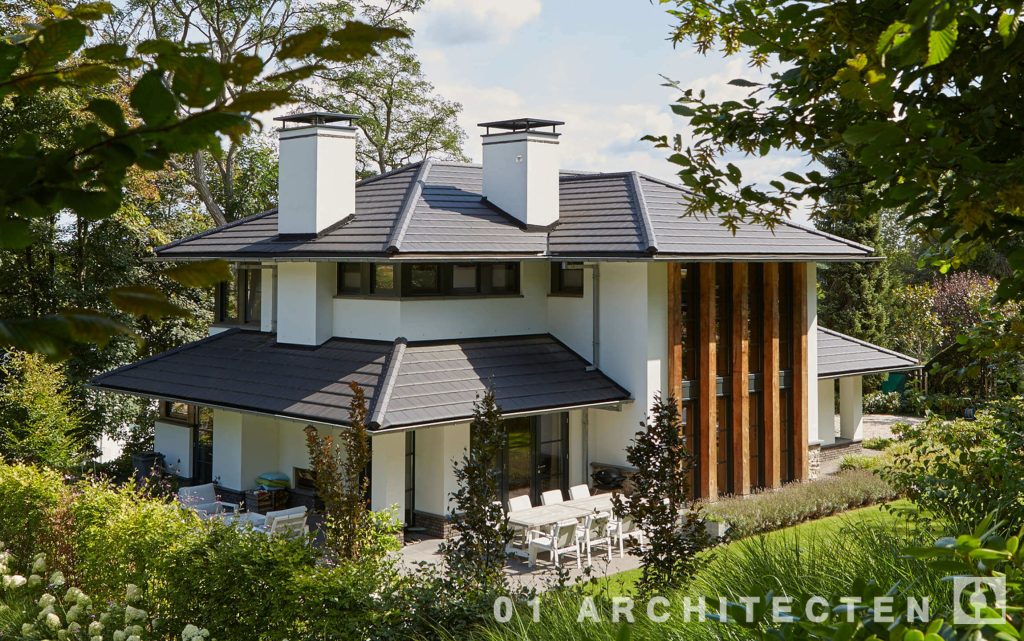 01 Architecten Almere - Strakke witte villa met speelse opbouw